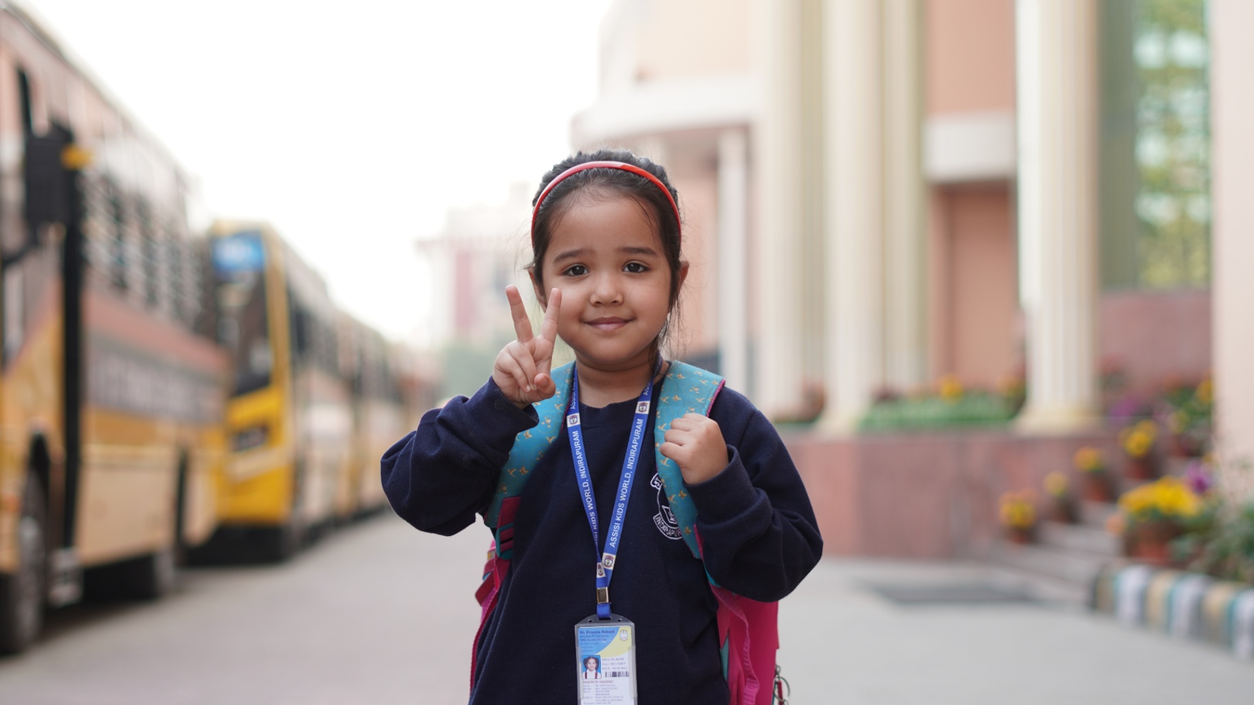 School student portrait with peace sign