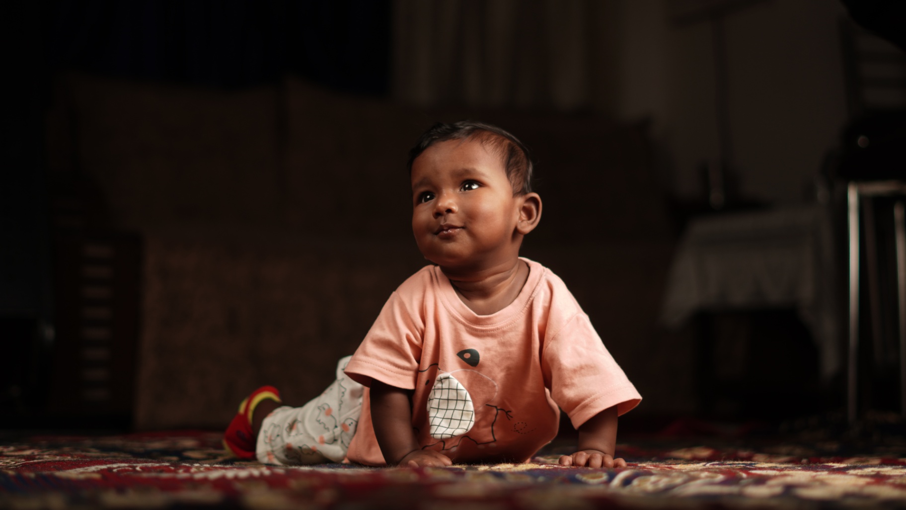 Toddler portrait on a patterned rug